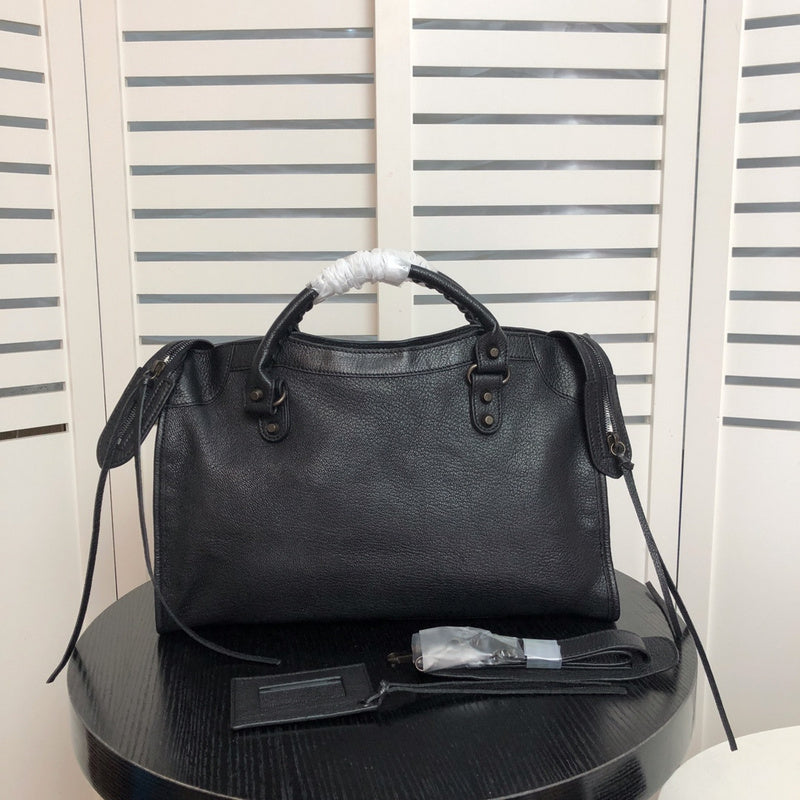 Front view of chic structured women's handbag – women's statement bag