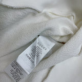 Front view of Gucci luxury clothing with logo-detail design