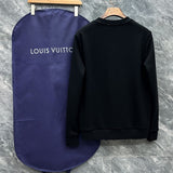 Side profile of Louis Vuitton luxury clothing with tailored silhouette