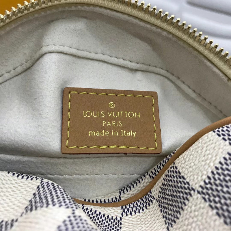 Side profile of signature everyday-luxe women's handbag – women's designer-style accessory
