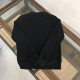 Close-up detail shot of Gucci luxury clothing with relaxed-fit cut