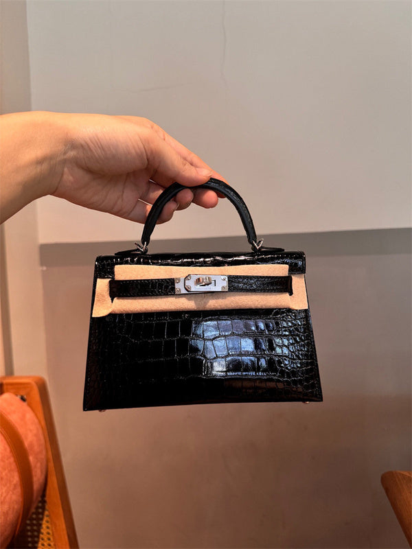 Side view of minimalist structured handbag