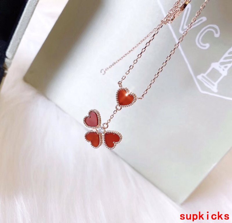 Lifestyle view of Van Cleef & Arpels unisex jewelry piece