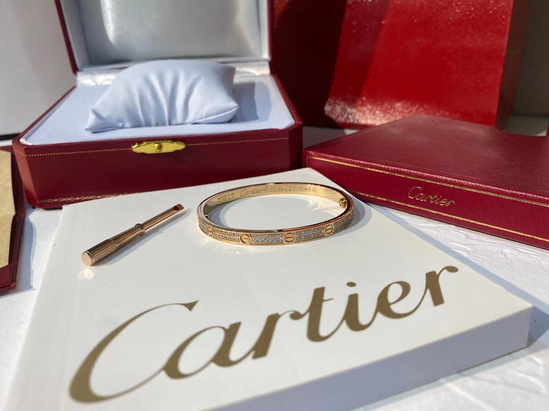 Close-up detail view of Cartier unisex jewelry piece