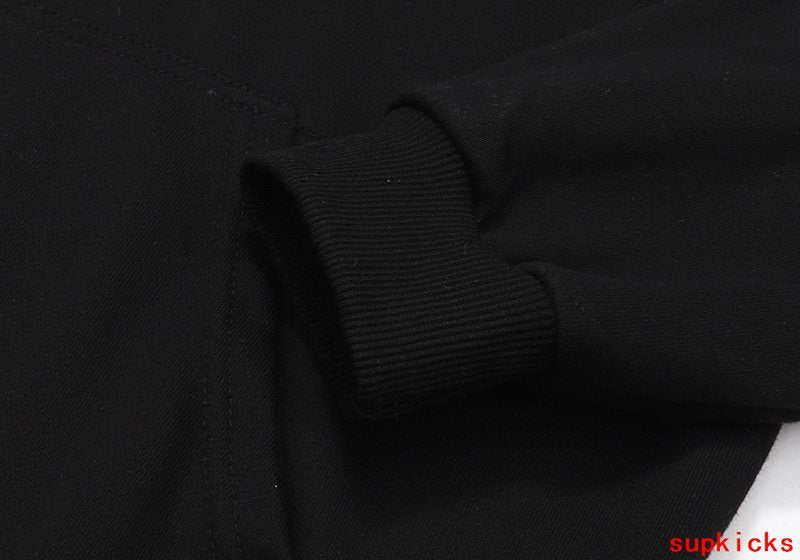 Side profile of Rhude luxury clothing with streetwear-inspired cut
