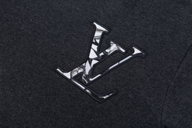 Full styled look of Louis Vuitton luxury clothing with signature branding