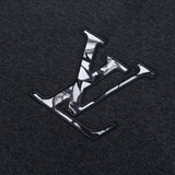 Full styled look of Louis Vuitton luxury clothing with signature branding