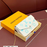  Signature carryall bag carried on shoulder