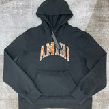 Front view of Amiri luxury piece style No.047