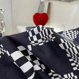 Close-up detail shot of Louis Vuitton luxury clothing with runway-inspired design