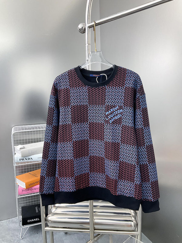 Back view of Louis Vuitton luxury clothing with label-forward styling