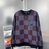 Back view of Louis Vuitton luxury clothing with label-forward styling