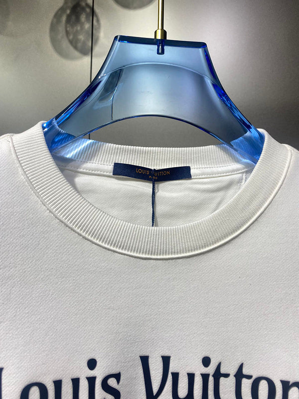 Front view of Louis Vuitton luxury clothing with runway-inspired design