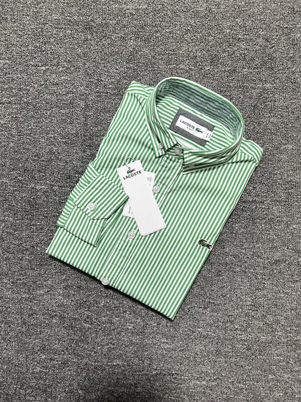 Side profile of Lacoste luxury clothing with monogram-inspired silhouette
