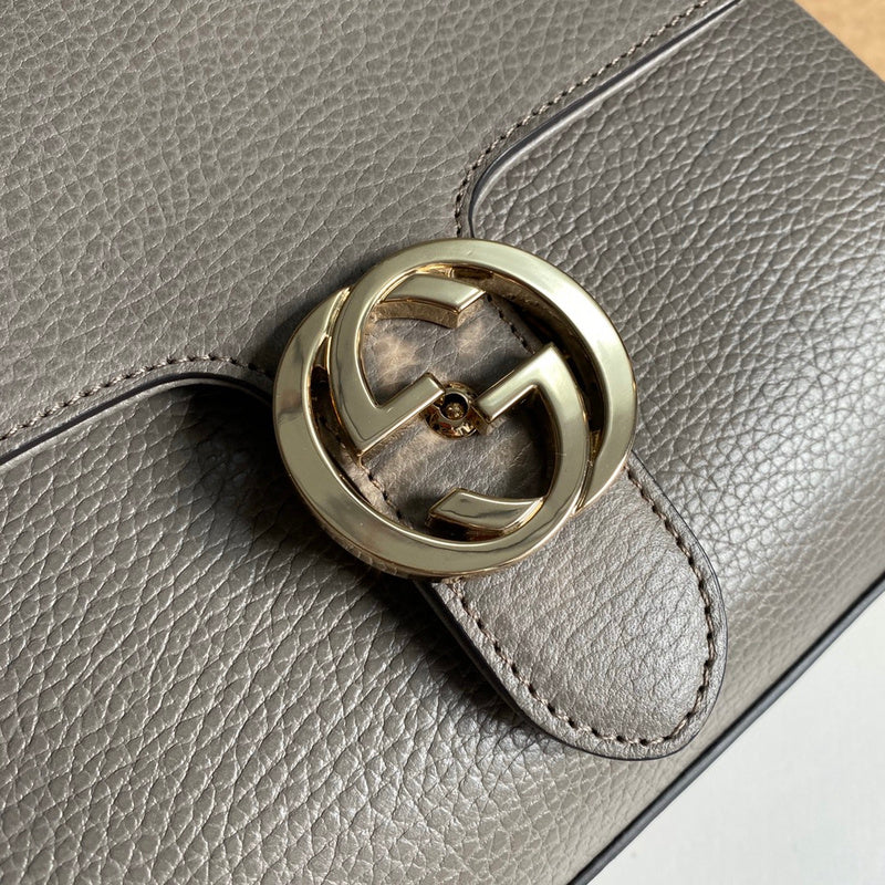 Back view of chic elevated women's handbag – women's statement bag