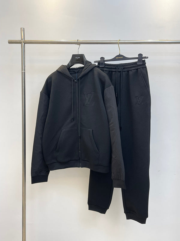Close-up detail shot of Louis Vuitton luxury clothing with label-forward styling