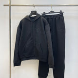 Close-up detail shot of Louis Vuitton luxury clothing with label-forward styling