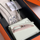  chic top-handle bag styled with outfit