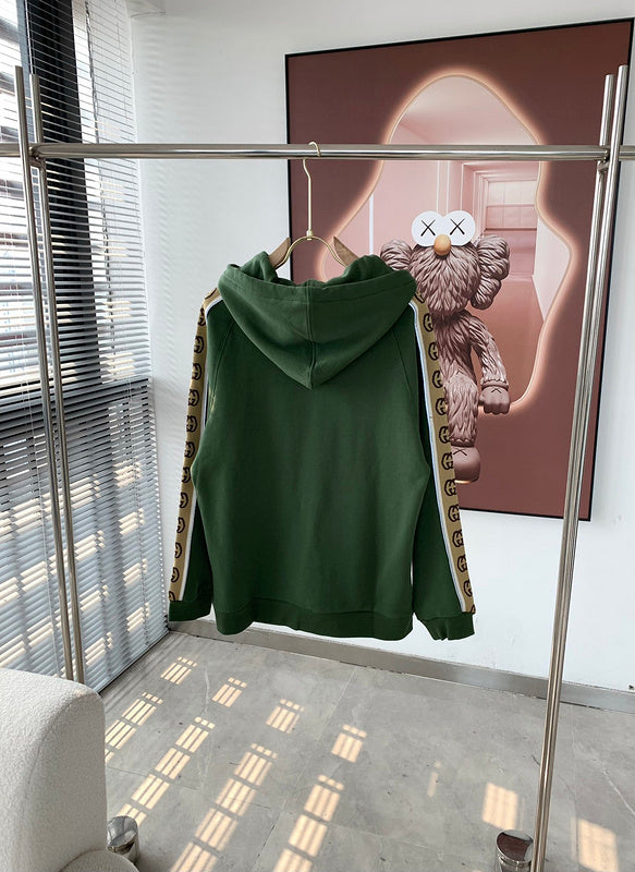 Close-up detail shot of Gucci luxury clothing with logo-detail design