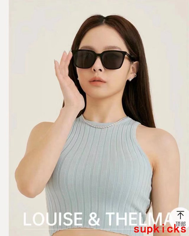 Close-up detail view of Louis Vuitton unisex sunglasses