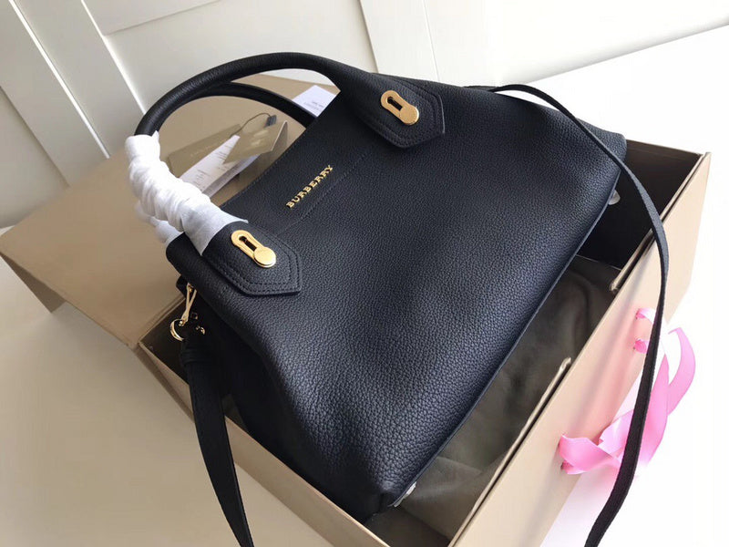 Ziva's Charm handbag – side angle view (one versatile size)