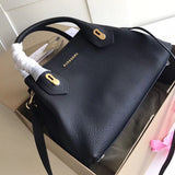 Ziva's Charm handbag – side angle view (one versatile size)