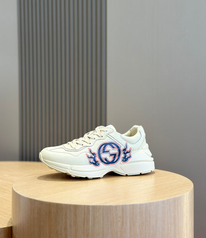 Side profile of Gucci classic monochrome sneakers everyday casual design