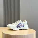 Side profile of Gucci classic monochrome sneakers everyday casual design