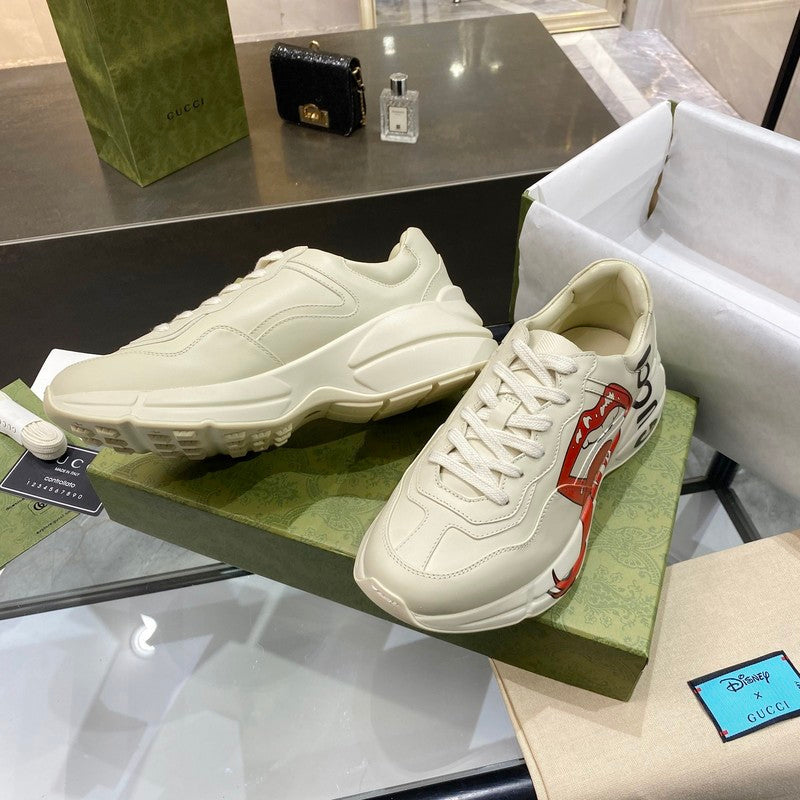 Gucci crisp white luxury sneakers view 5 retro runner design