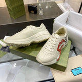Gucci crisp white luxury sneakers view 5 retro runner design
