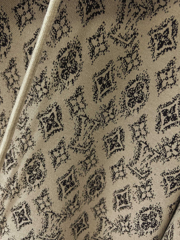 Front view of Louis Vuitton luxury clothing with logo-detail design