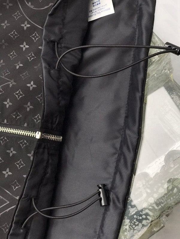 Side profile of Louis Vuitton luxury clothing with tailored silhouette