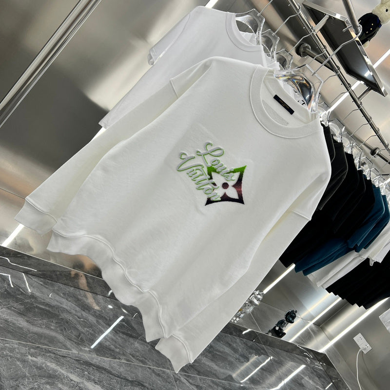 Close-up detail shot of Louis Vuitton luxury clothing with relaxed-fit cut