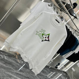 Close-up detail shot of Louis Vuitton luxury clothing with relaxed-fit cut