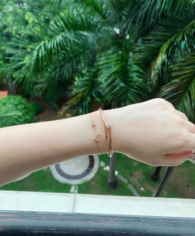 Side view of Cartier unisex jewelry piece