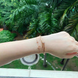 Side view of Cartier unisex jewelry piece