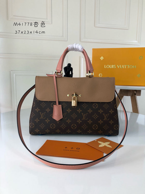 Side profile of chic signature women's handbag – women's luxury handbag