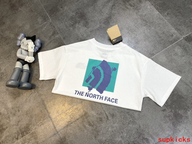 Flat lay presentation of Rhude luxury clothing with streetwear-inspired cut