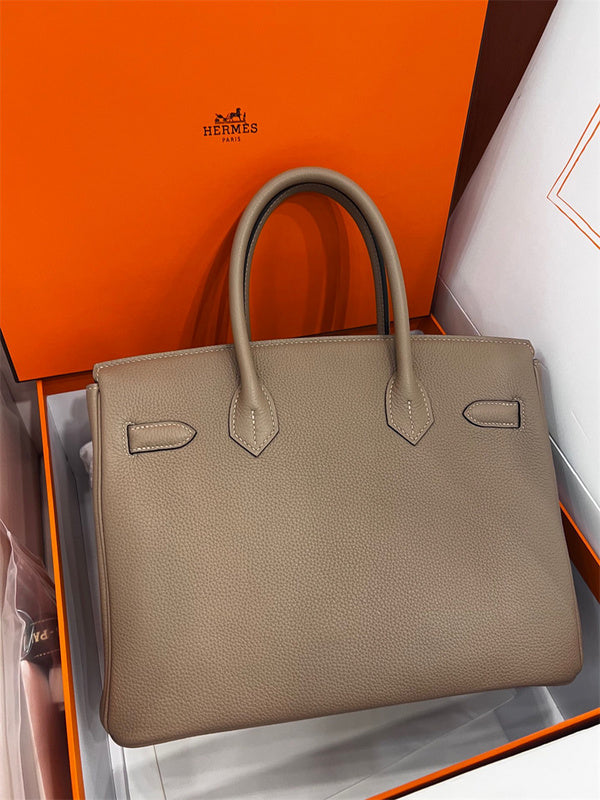  sleek top-handle bag detail view showing craftsmanship 8