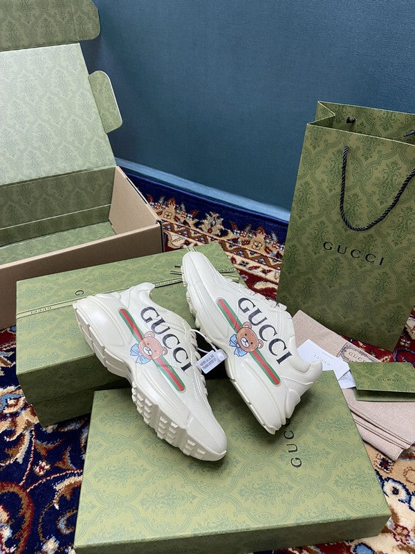 Gucci clean off-white luxury sneakers view 7 bold athletic profile