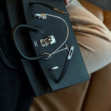 Side view of considered structured handbag