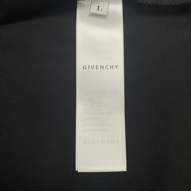 Front view of Givenchy luxury clothing with monogram-inspired silhouette