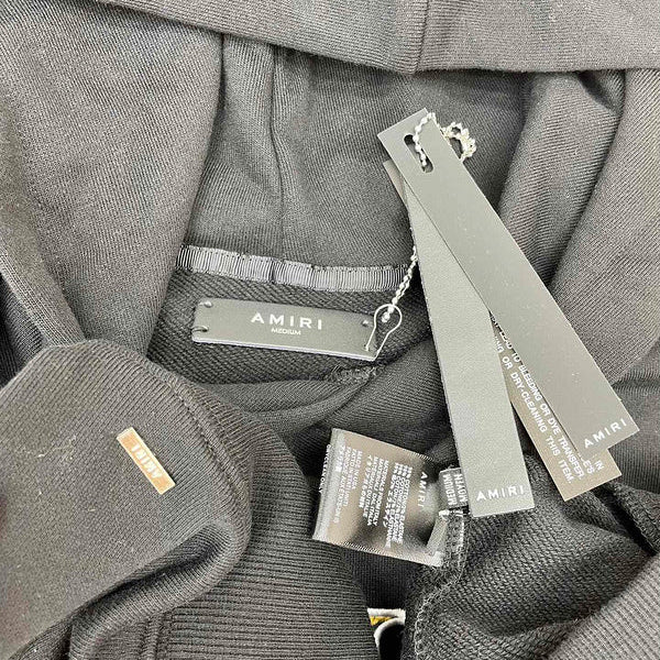 Three-quarter angle view of Amiri luxury piece style No.037