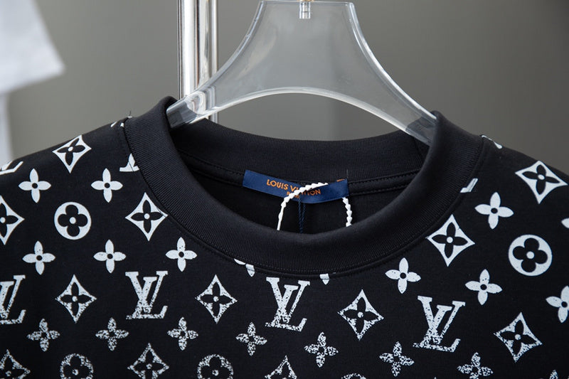 Close-up detail shot of Louis Vuitton cotton t-shirt with signature branding