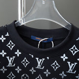 Close-up detail shot of Louis Vuitton cotton t-shirt with signature branding