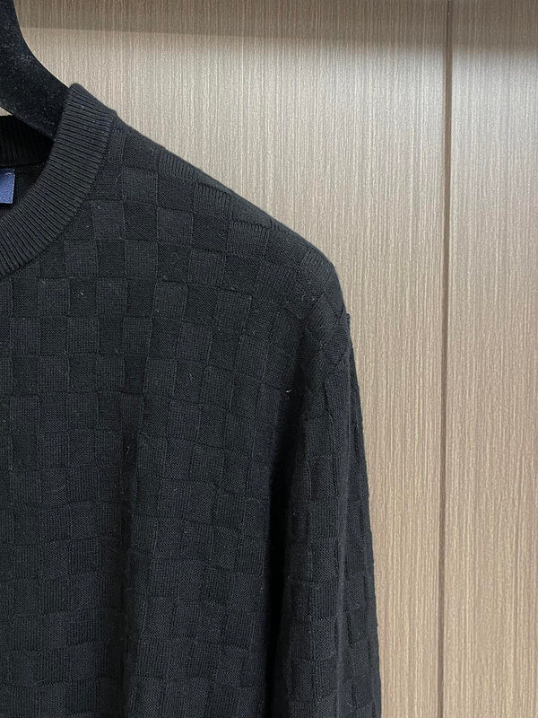 Full styled look of Louis Vuitton luxury clothing with label-forward styling