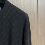 Full styled look of Louis Vuitton luxury clothing with label-forward styling