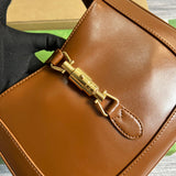 Handle and strap detail of polished sleek women's handbag – women's designer-style accessory