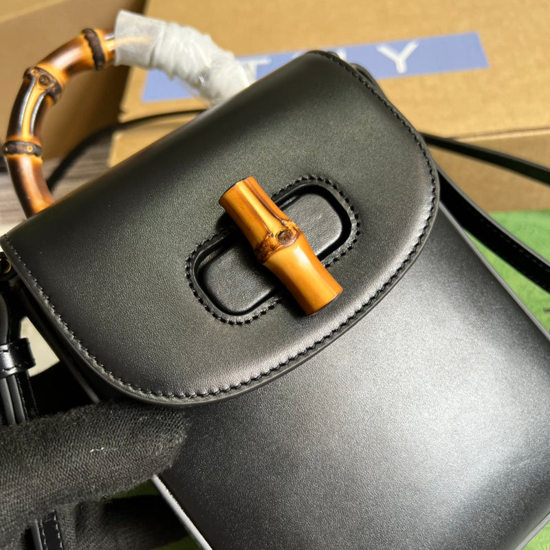 Front view of sleek signature women's handbag – women's luxury accessory