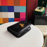 Styled lifestyle shot of signature classic women's handbag – women's luxury accessory